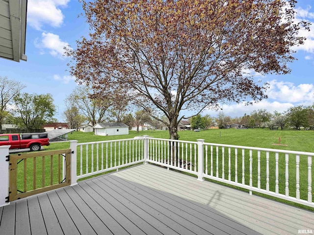 370 W Carter St, Fairview, IL 61432 - wooden deck featuring a lawn