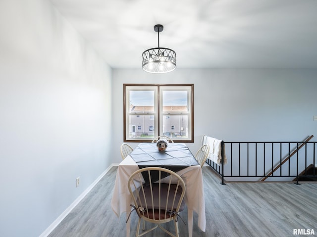1024 Florence Ave, Pekin, IL 61554 - dining room featuring light wood-style flooring and baseboards