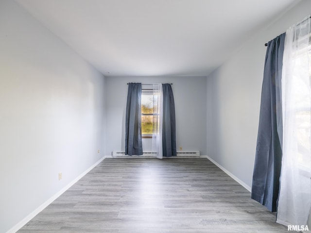1024 Florence Ave, Pekin, IL 61554 - empty room with wood finished floors and baseboards