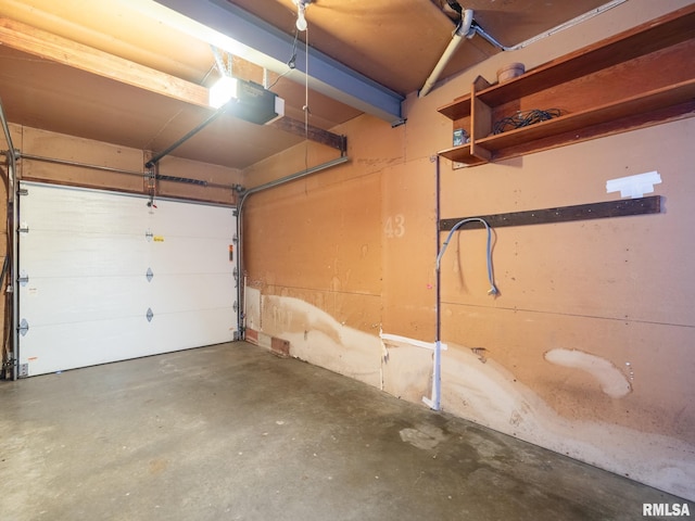1024 Florence Ave, Pekin, IL 61554 - garage featuring a garage door opener