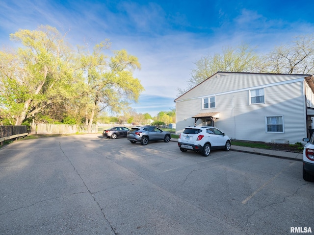 1024 Florence Ave, Pekin, IL 61554 - uncovered parking lot featuring fence