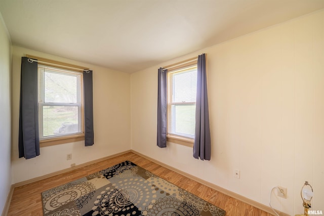 212 S Cone St, Farmington, IL 61531 - unfurnished room featuring light wood-style flooring and baseboards