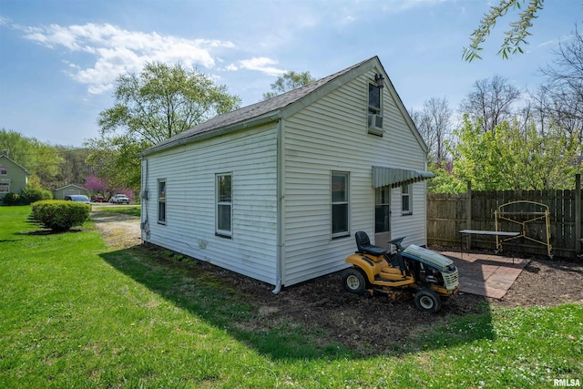 212 S Cone St, Farmington, IL 61531 - exterior space featuring fence and a lawn