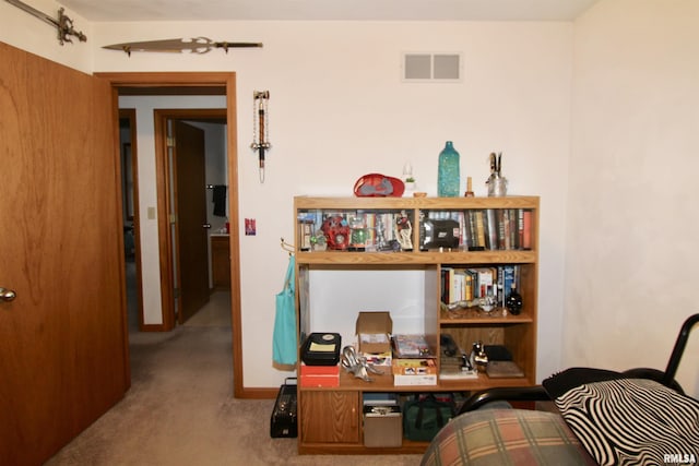 carpeted office space with visible vents