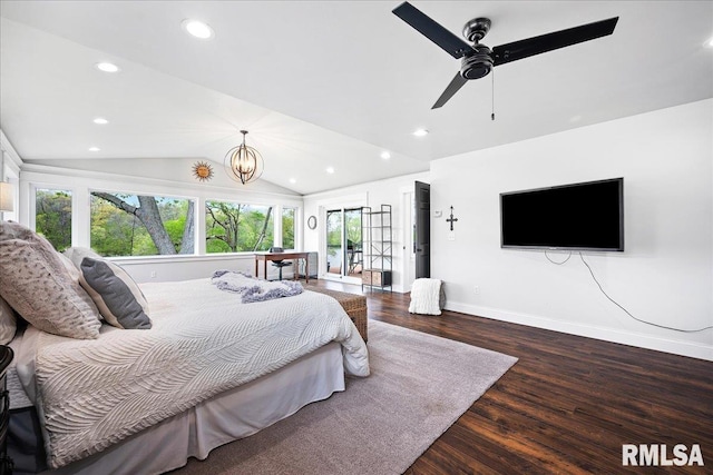 bedroom featuring ceiling fan with notable chandelier, recessed lighting, baseboards, wood finished floors, and vaulted ceiling