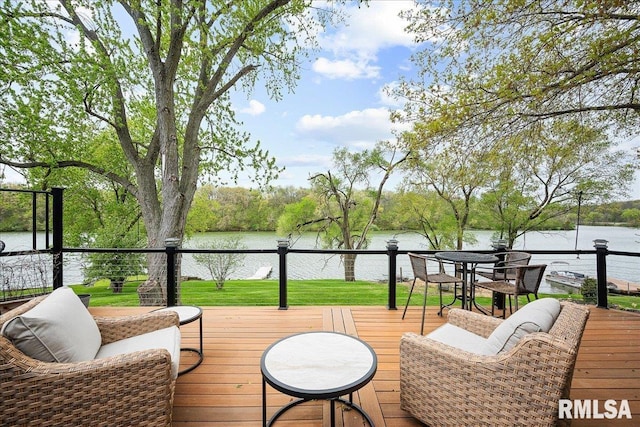 deck featuring a water view