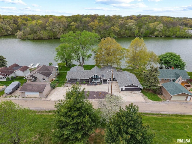 bird's eye view featuring a residential view and a water view