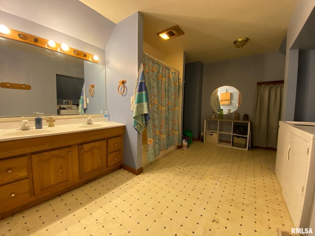 bathroom with a sink, tile patterned floors, double vanity, and a shower with shower curtain