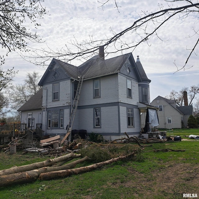 exterior space featuring a chimney