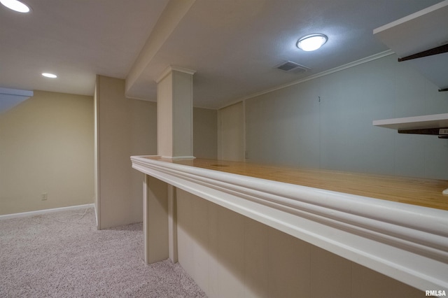 hallway with recessed lighting, visible vents, light colored carpet, and baseboards
