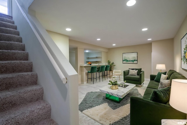 living room featuring stairway, recessed lighting, marble finish floor, and baseboards