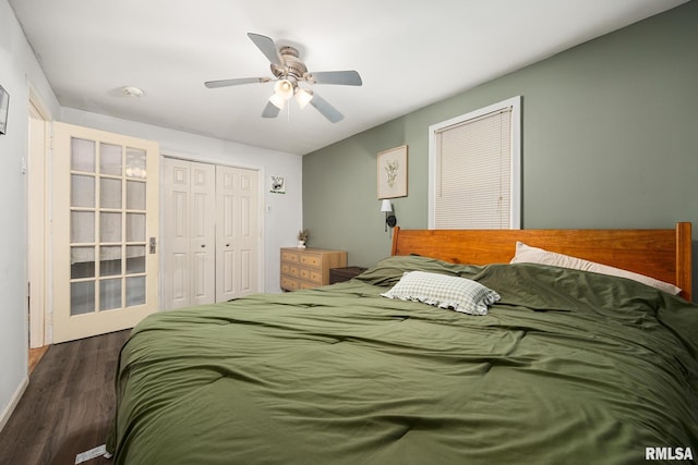 bedroom featuring a closet, a ceiling fan, and wood finished floors