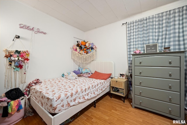 bedroom featuring light wood-type flooring