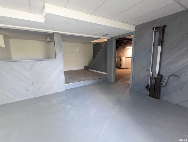 3809 N Fisk Rd, Astoria, IL 61501 - finished below grade area with wood walls, water heater, and stairway
