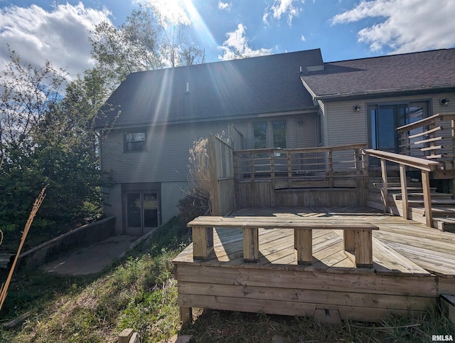 3809 N Fisk Rd, Astoria, IL 61501 - back of house with a shingled roof and a wooden deck