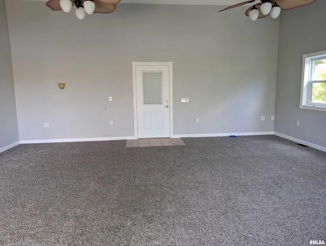 3809 N Fisk Rd, Astoria, IL 61501 - empty room with baseboards, ceiling fan, and carpet