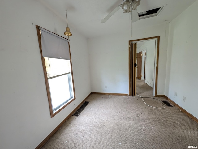 1407 Martha St, Pekin, IL 61554 - spare room with light carpet and ceiling fan