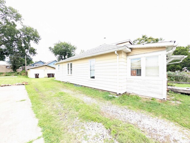1407 Martha St, Pekin, IL 61554 - view of home's exterior featuring a yard
