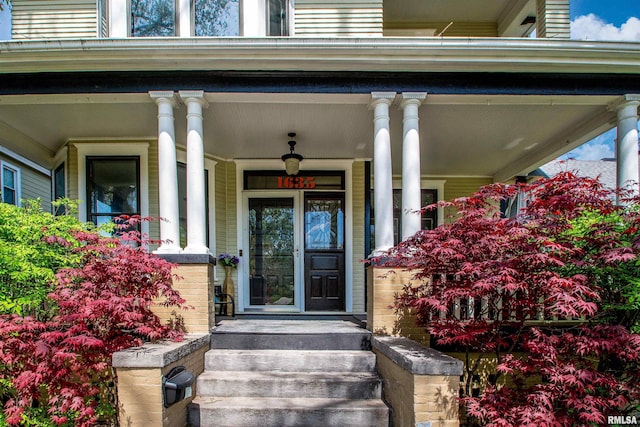 entrance to property with a porch