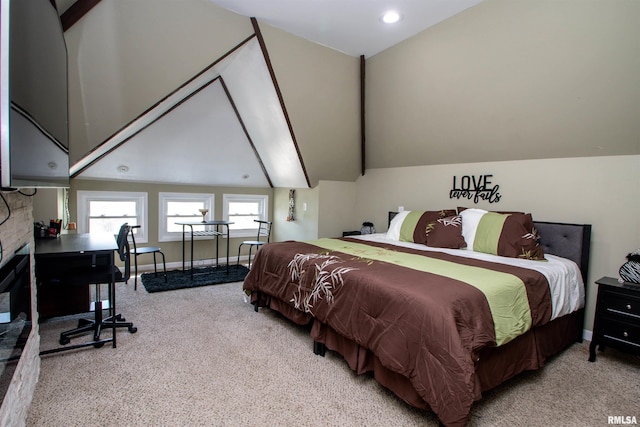 bedroom featuring baseboards, vaulted ceiling, and carpet floors