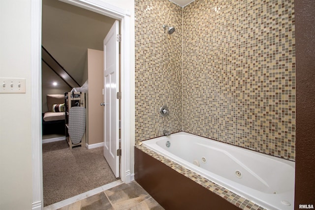 bathroom featuring a combined bath / shower with jetted tub