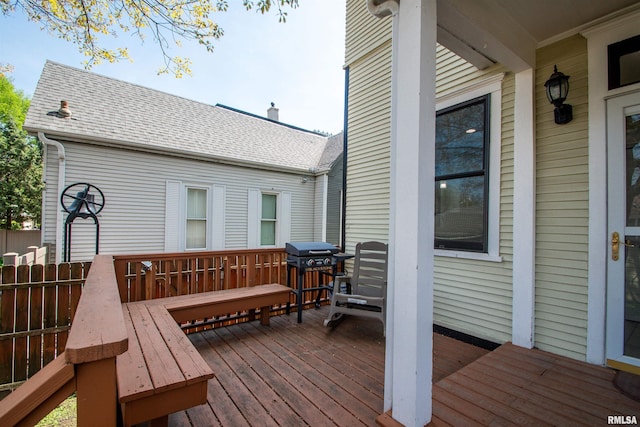wooden terrace featuring grilling area
