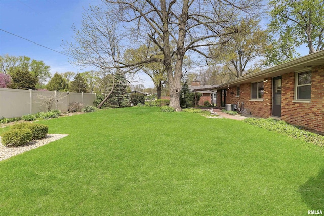 view of yard with fence