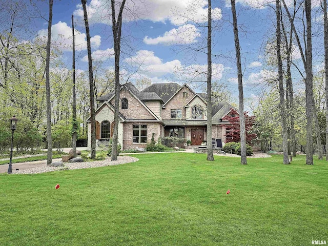 craftsman-style home with a front lawn