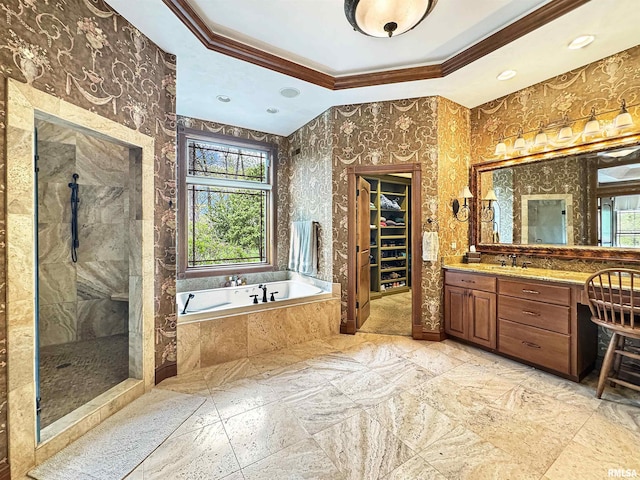 bathroom with plenty of natural light, ornamental molding, a garden tub, and tiled shower
