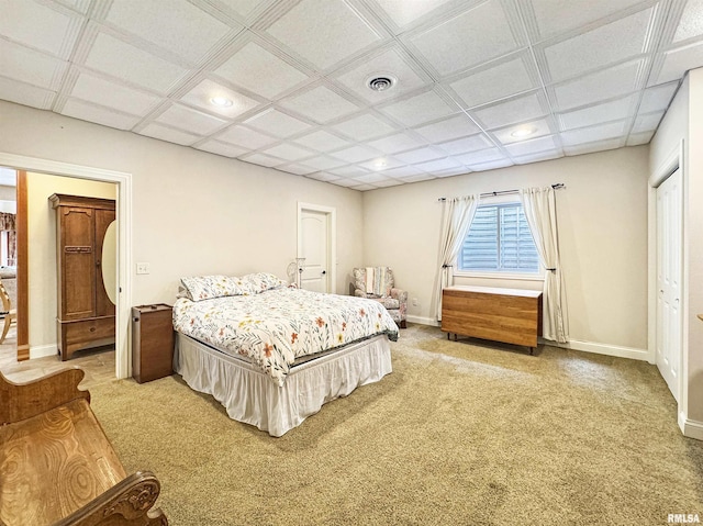 bedroom with light colored carpet, recessed lighting, baseboards, and visible vents