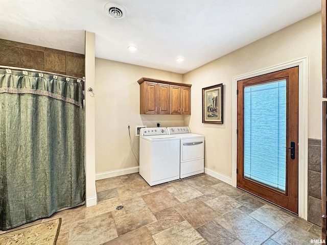 laundry area featuring independent washer and dryer, laundry area, baseboards, stone finish flooring, and visible vents