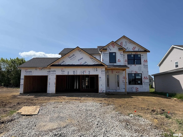 2610 W Arden Way, Dunlap, IL 61525 - unfinished property featuring gravel driveway and an attached garage
