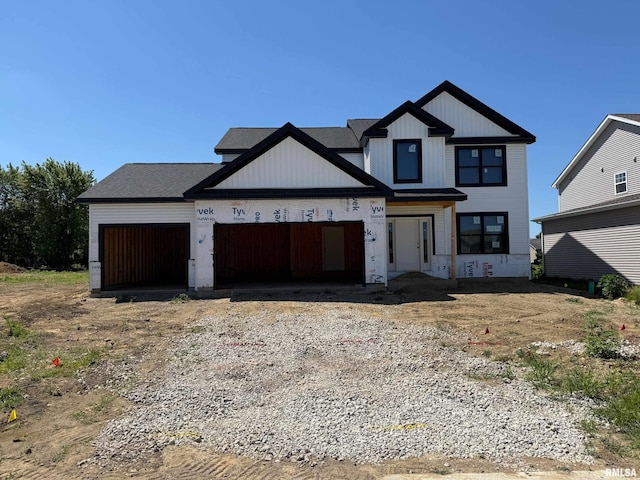 2610 W Arden Way, Dunlap, IL 61525 - unfinished property featuring gravel driveway and an attached garage