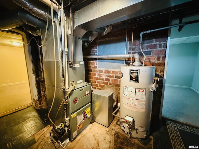 utility room featuring gas water heater