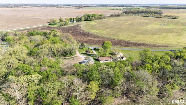 birds eye view of property featuring a rural view