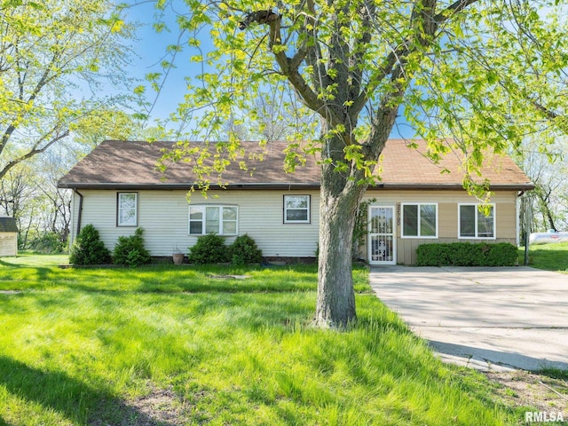 exterior space with a front yard