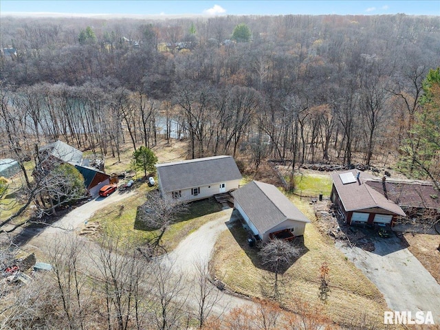 bird's eye view with a forest view