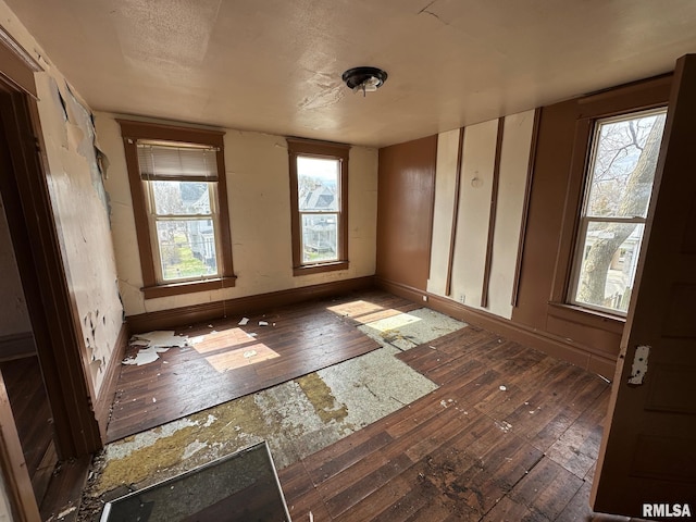 707 E Ravine Ave, Peoria, IL 61603 - spare room with hardwood / wood-style flooring and baseboards
