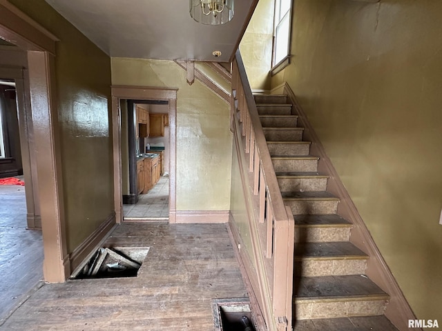 707 E Ravine Ave, Peoria, IL 61603 - stairs with wood finished floors