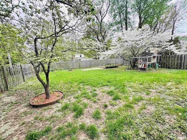 711 E Piper St, Macomb, IL 61455 - view of yard with a playground