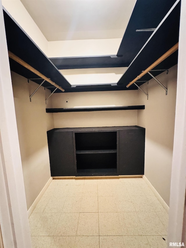 711 E Piper St, Macomb, IL 61455 - spacious closet with tile patterned floors