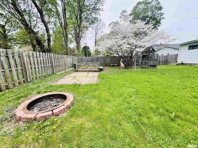 711 E Piper St, Macomb, IL 61455 - view of yard with a fire pit and a patio