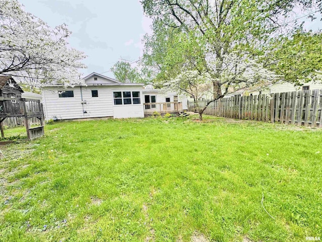 711 E Piper St, Macomb, IL 61455 - view of yard with a wooden deck