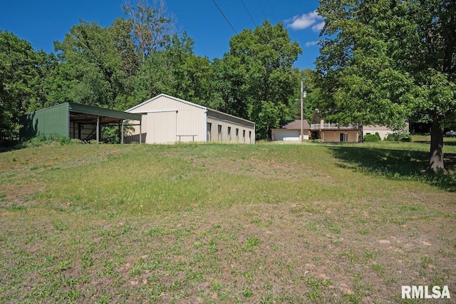 25633 N County Road 2500 E, Manito, IL 61546 - view of grassy yard with a pole building and an outdoor structure