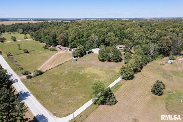 25633 N County Road 2500 E, Manito, IL 61546 - aerial view of property's location with rural landscape and a heavily wooded area
