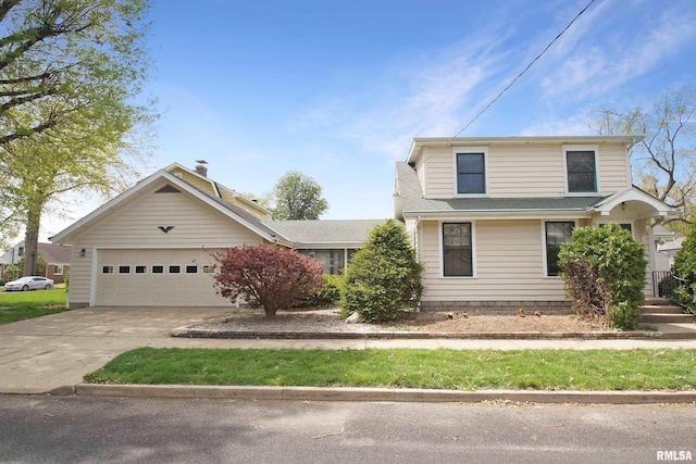 view of front of home with an attached garage and driveway