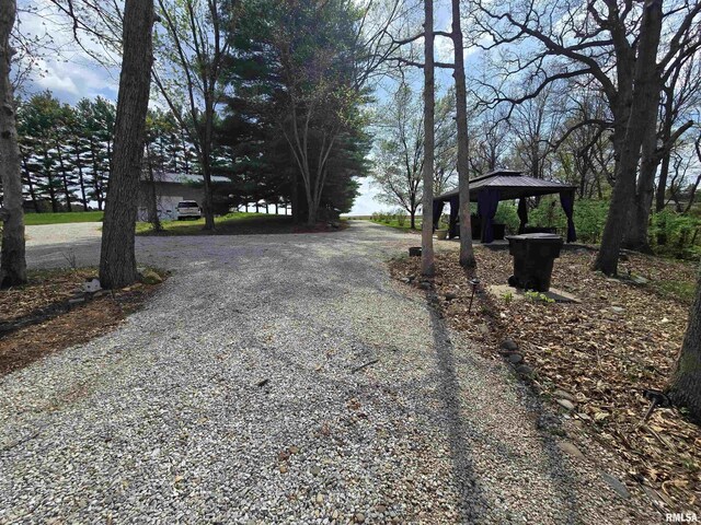 view of road featuring driveway