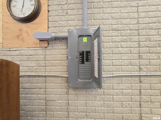 utility room with electric panel