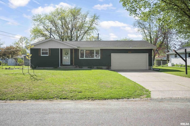 ranch-style home with fence, driveway, a front yard, and a garage