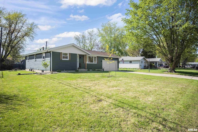 single story home featuring a garage, concrete driveway, and a front lawn